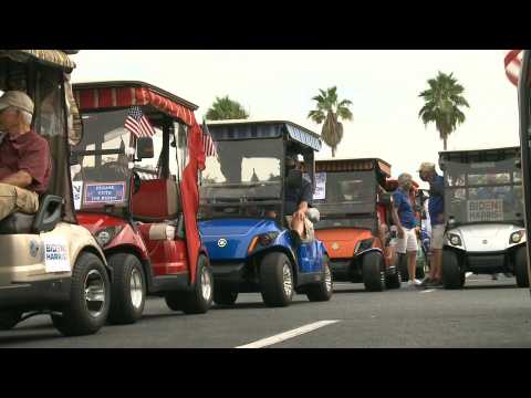 Senior citizens rally for Biden with a golf cart caravan