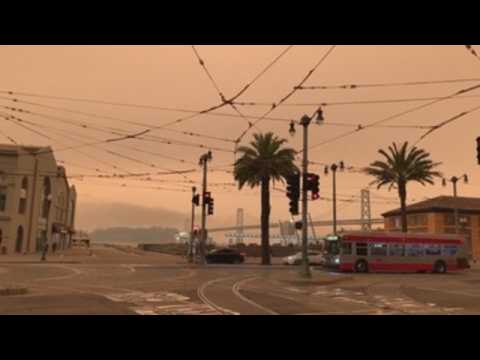 San Francisco skies turn dark orange as wildfires rage across California