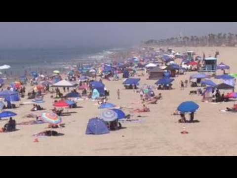 California beaches packed as temperatures soar