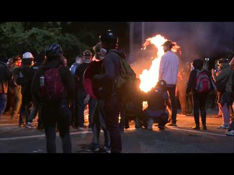 Portland protesters burn pallets during demonstration