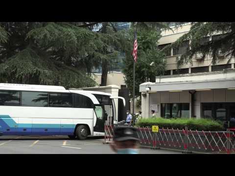 China: images of a bus entering in US Chengdu consulate