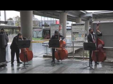 Bogota Philharmonic Orchestra brings healing power of music to public transport