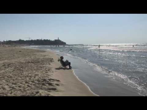Beach day in Tel Aviv amid more restrictive coronavirus measures