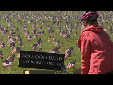 US Covid deaths memorialized on the National Mall as toll passes 200,000