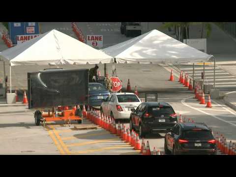 Drivers queue to get tested for Covid-19 in Miami as US death toll nears 200,000