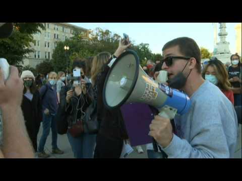 Verbal confrontations outside the US Supreme Court as anti-abortion activists disrupt peaceful mourners