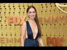 Emilia Clarke channels Jennifer Lopez's Hustlers character Ramona at Emmys