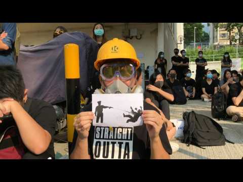 Sit-in at school of Hong Kong protester shot by police