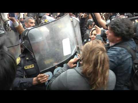 Confrontation between police and protesters outside Peru Congress