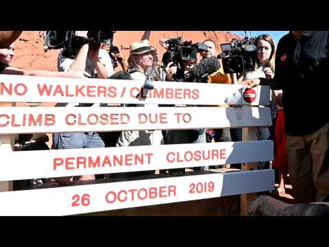 Uluru closed to climbers after crowds make final ascent