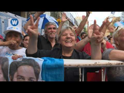 People celebrate as leftist Fernandez leads in Argentine poll