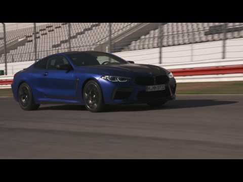 The new BMW M8 Coupé Driving on the Racetrack