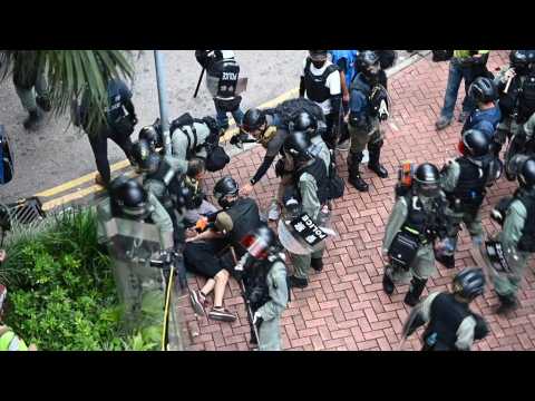 Hong Kong police make arrests as small flashmob protests erupt