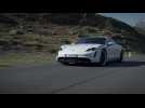 The new Porsche Taycan Turbo S in white Driving Video