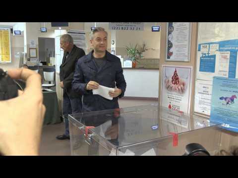 Polish politician Robert Biedron votes in the parliamentary elections