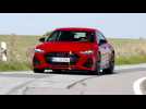 The new Audi RS 7 Sportback in Tango red Driving Video