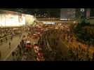 Hong Kong: activists swarm to block major road