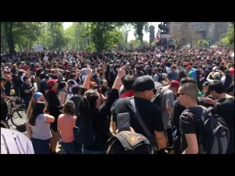 Thousands gather in central Santiago square over transport price hike