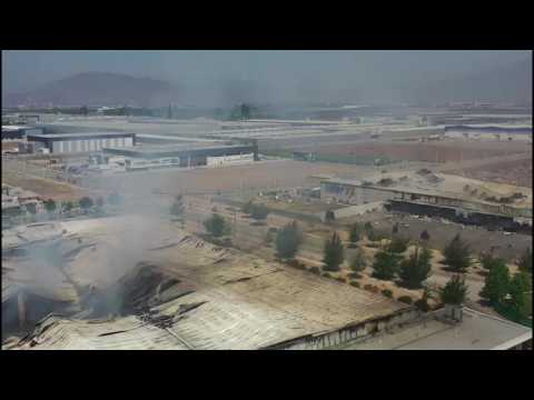 Drone images of Chile torched factory where 5 people died