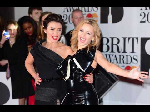 Kylie Minogue pays tribute to sister Dannii on her 48th birthday