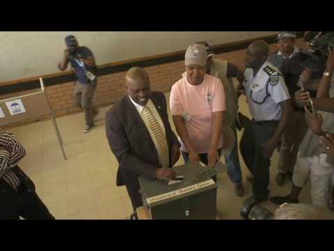 Botswana's President Mokgweetsi Masisi casts vote in election