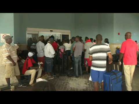 Queue at Bahamas airport as people try to evacuate Hurricane damaged islands