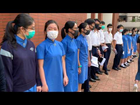 HK pupils form human chain to show solidarity