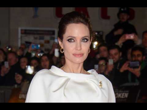 Angelina Jolie trains with kids