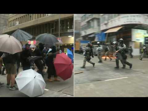 Tear gas, petrol bombs as Hong Kong police clash with protesters