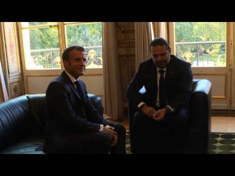 Emmanuel Macron greets Lebanese PM Saad Hariri