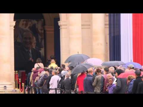 French pay their final respects as Chirac lies in state