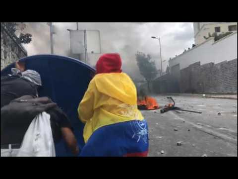 Clashes erupt between protesters and police in Quito