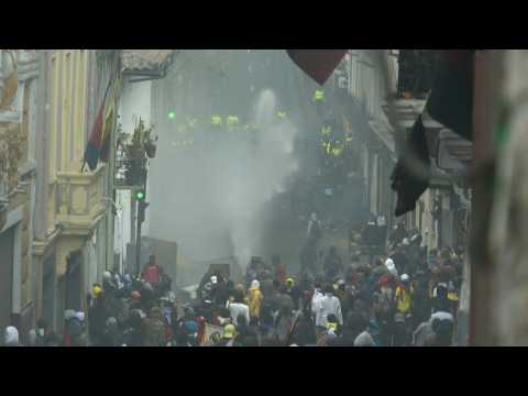 Police fire water cannons at protesters in Ecuador