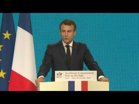 France's Macron pledges to hike donations to fight epidemics