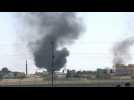 Smoke billows above Tal Abyad as Turkey strikes Syrian border towns
