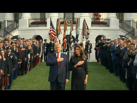 US President and First Lady observe moment of silence for victims of 9/11