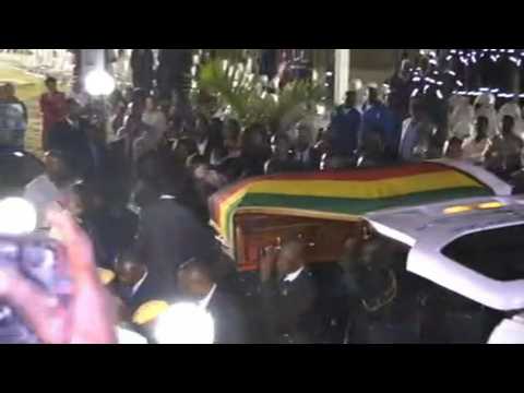 Coffin of ex-president Mugabe arrives at his former residence "Blue Roof" in Harare
