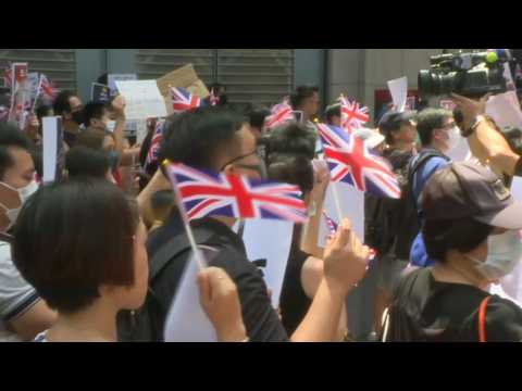 Hong Kong: pro-democracy protesters gather outside British consulate