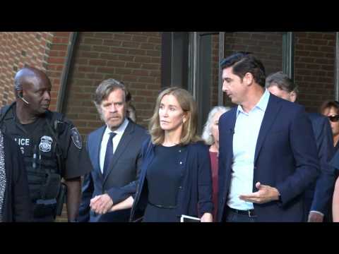 Actress Felicity Huffman leaves court, sentenced to 14 days in jail