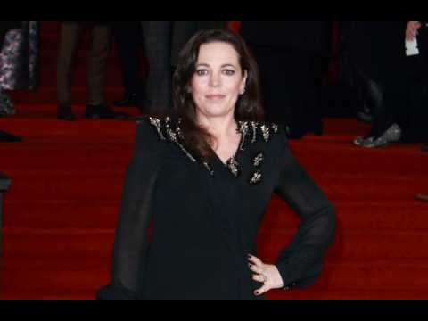 Olivia Colman's powerful outfits