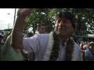 Supporters greet Bolivia's Evo Morales before vote
