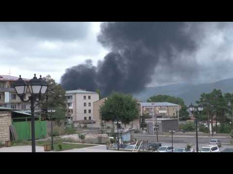 Smoke billows above Nagorno-Karabakh's main city Stepanakert after heavy shelling