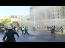 Chile protesters dispersed with water cannons as outcry continues