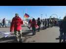 Dozens make human chain for peace in Germany