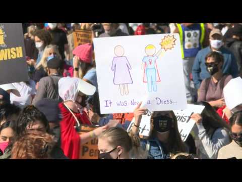 Protesters gather at Freedom Plaza for Washington, DC women's march