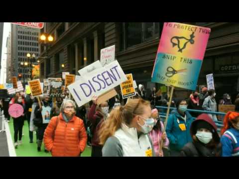Protesters march in Chicago to protest SCOTUS nominee