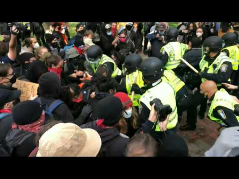 Police make arrests, clash with anti-Trump protesters in Boston