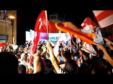 Turkish Cypriots celebrate after Ankara-backed Ersin Tatar win