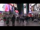 New Yorkers watch election results come in on iconic Times Square
