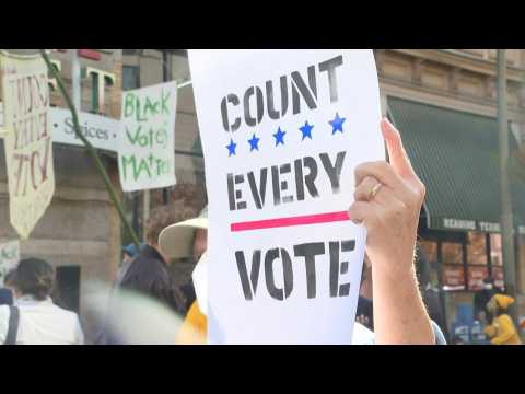Trump supporters and opponents hold duelling rallies in Philadelphia